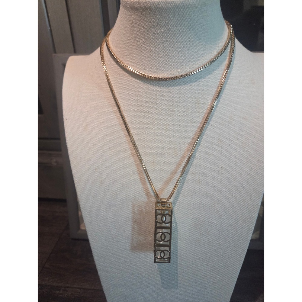 Gold Tone Interlocking Logo Cage Pendant Long Necklace with Crystals